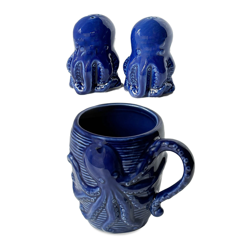A coastal-inspired kitchen set featuring a blue octopus coffee mug with intricate marine detailing and a pair of blue octopus salt and pepper shakers.