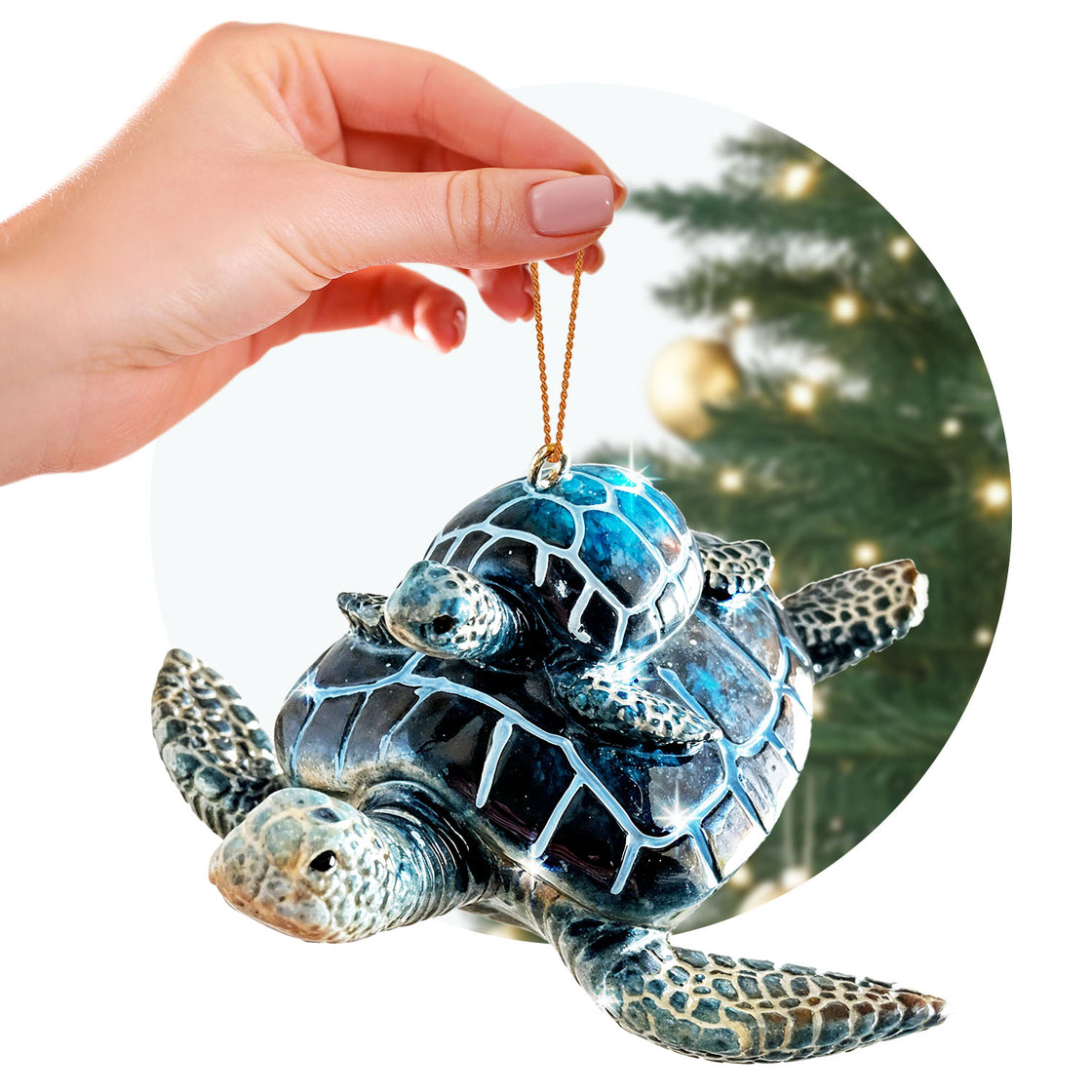 A person holds a glossy sea turtle ornament, featuring a smaller turtle on its shell.