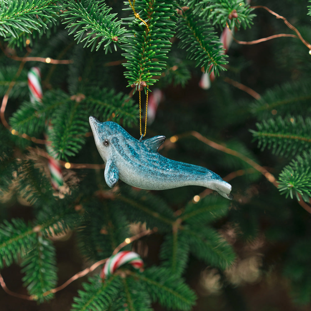 rengöra hand-painted blue dolphin suspended gracefully from a tree branch
