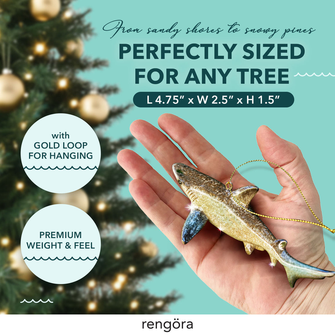 A ceramic shark ornament with a golden loop for hanging, showcased in a hand with a decorated Christmas tree in the blurred background and text highlighting its premium size and feel.
