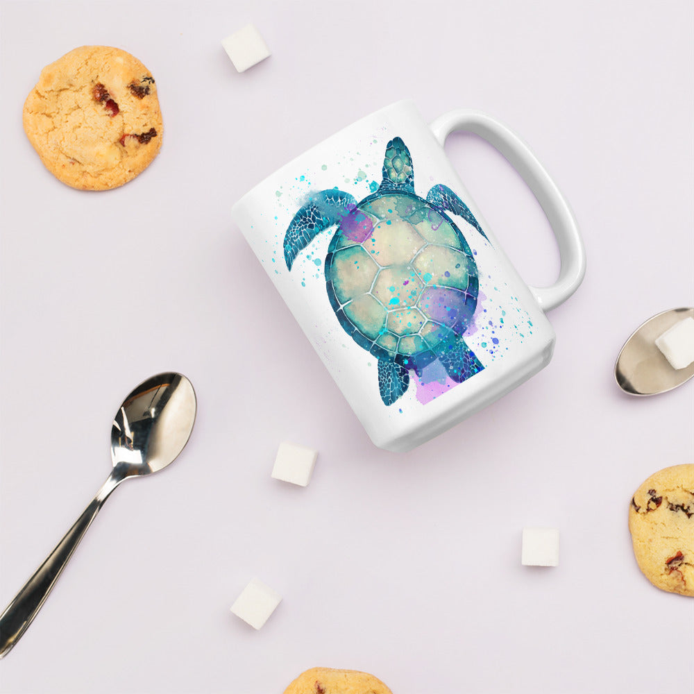 15 oz sea turtle coffee or tea mug shown with cookies and spoon with sugar cubes