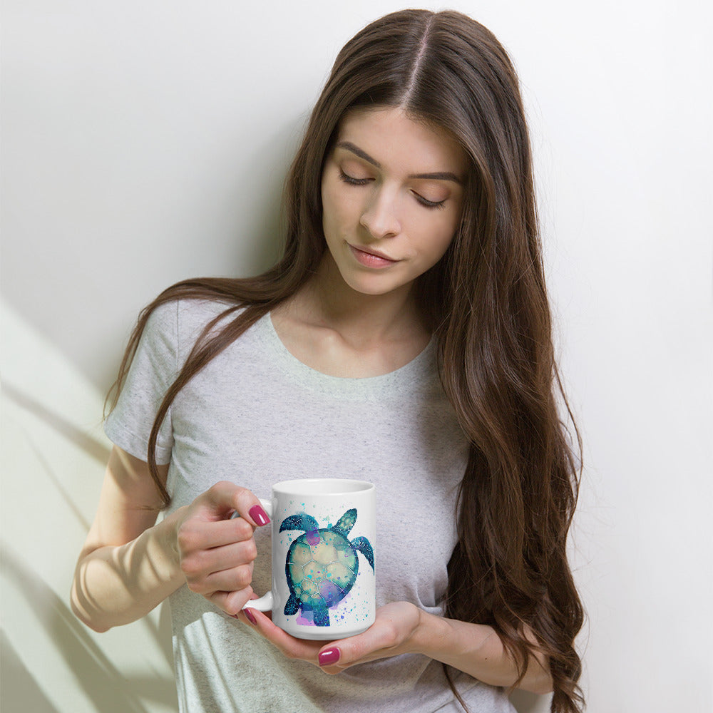 young woman holding 15 oz sea turtle tea mug