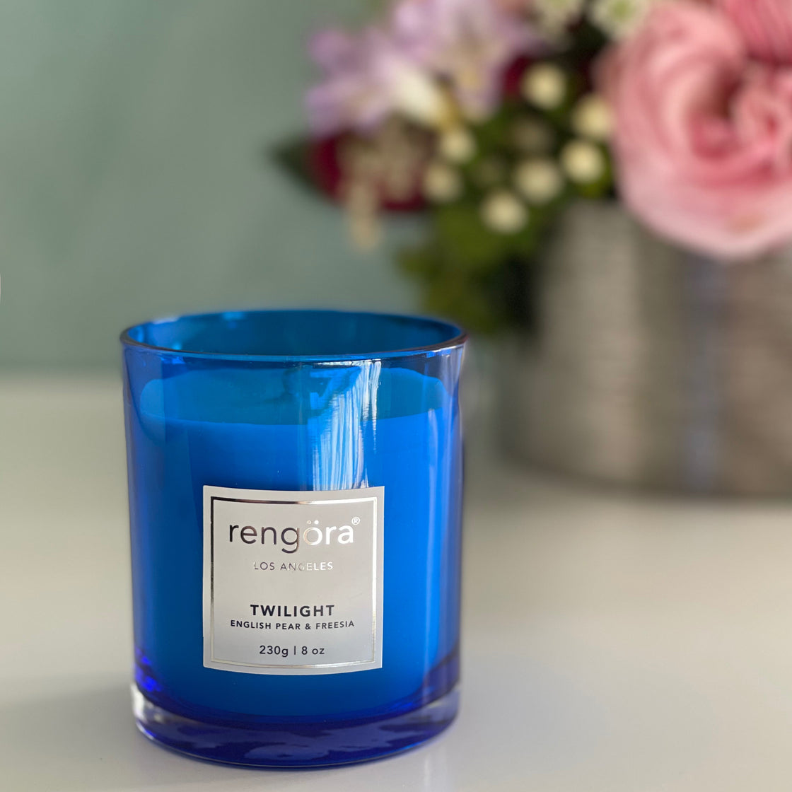 rengöra's Twilight scented candle for the home - English pear and freesia in a beautiful cobalt blue colored glass
