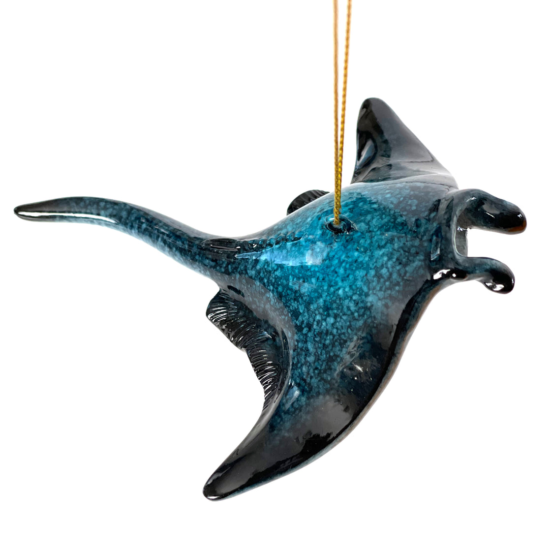 A hand-painted ceramic Christmas ornament in a soothing blueish hue showcasing a beautifully crafted manta ray design set against a clean white background by rengora