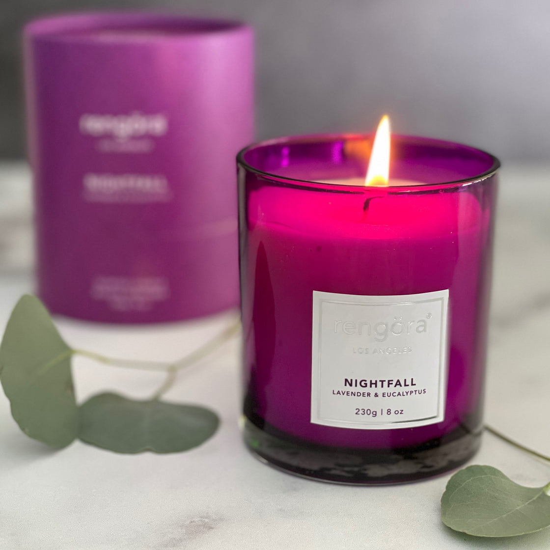 Nightfall: Lavender & Eucalyptus scented soy wax candle with eucalyptus leaves and beautiful purple packaging
