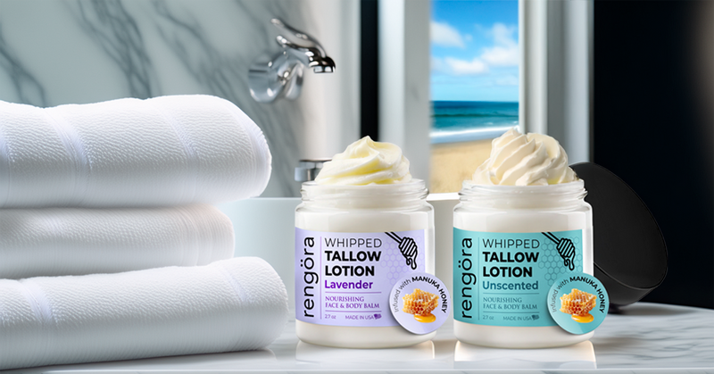 rengöra's lavender and unscented tallow lotion jars on marble bathroom counter with white towels 