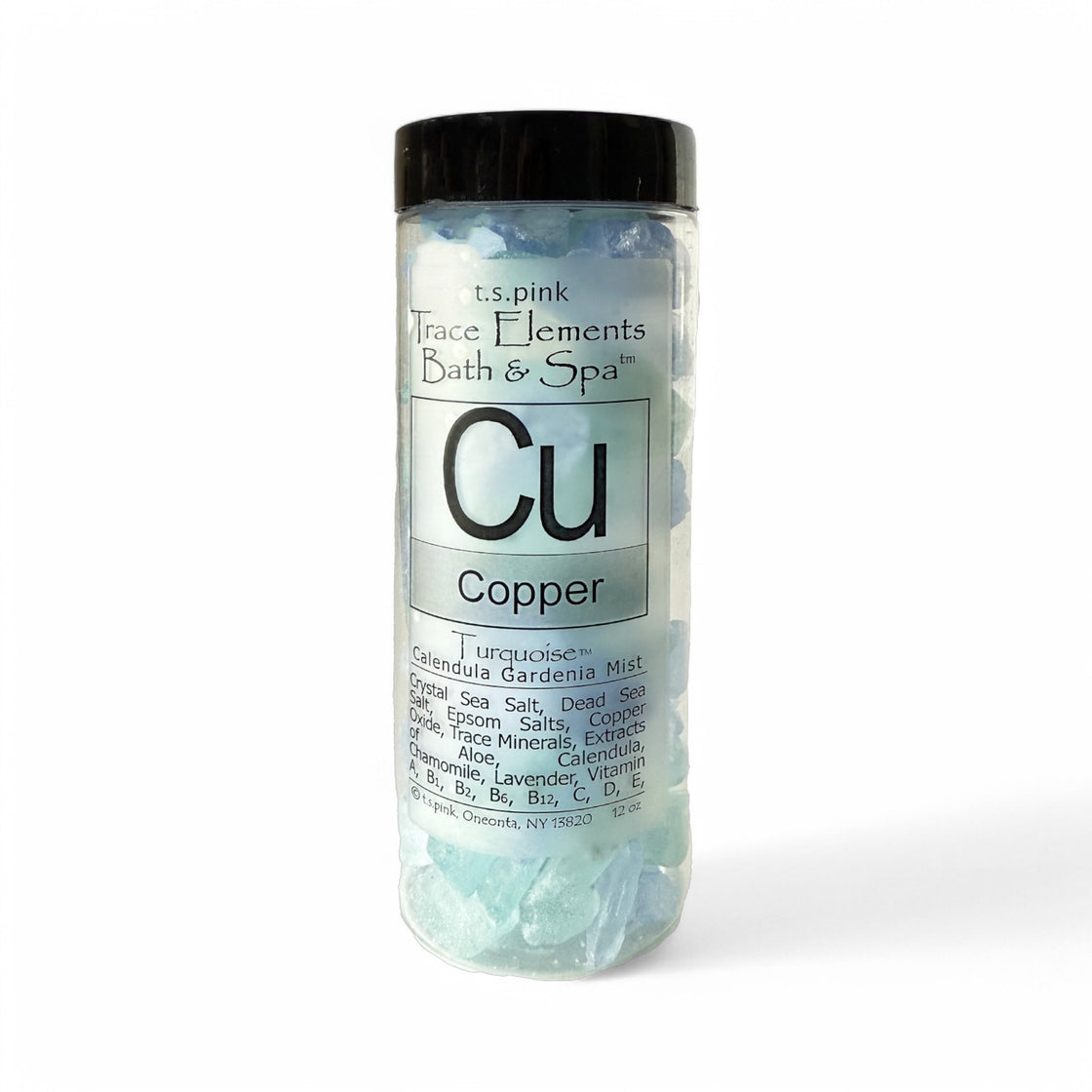 Copper Rengöra Bath Salts Jar filled with blue salts. The packaging highlights ingredients like sea salts, copper oxide, botanical extracts, and vitamins for a spa-like bath experience.