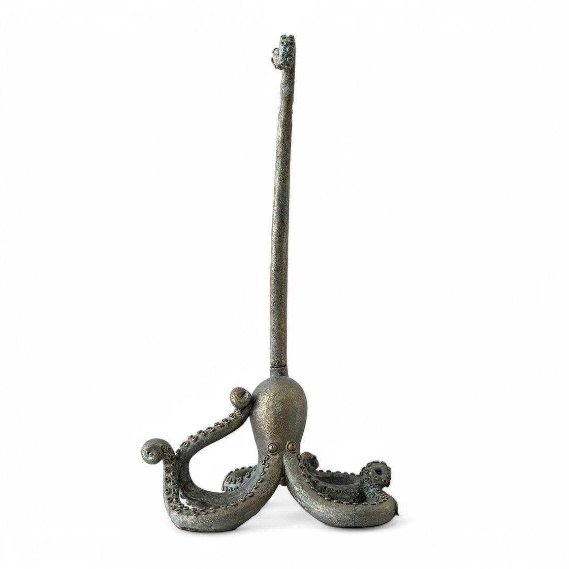 Isolated image of the octopus-shaped paper towel holder on a white background, showing its sculptural tentacle design and patina finish.