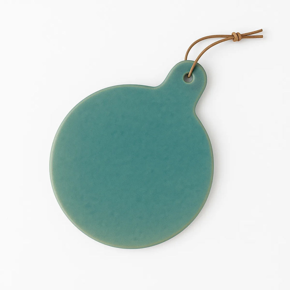 Rengöra round teal ceramic cheese platter with leather tie detail on white background