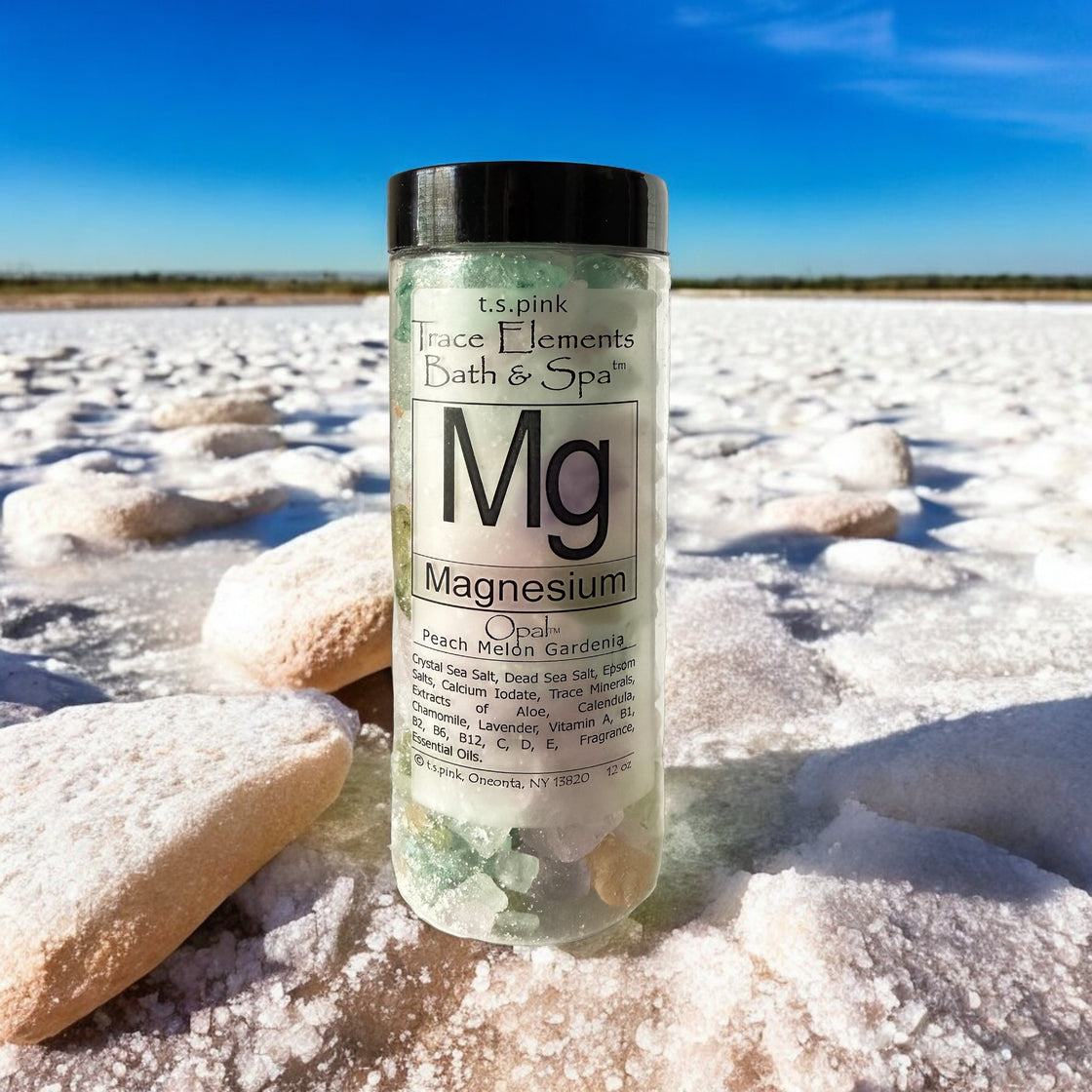 A jar filled with  Rengöra colorful bath salts infused with Magnesium. The background showcases a vast, open landscape under a bright blue sky.