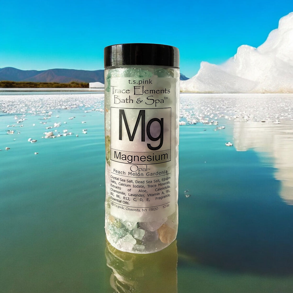 A Rengöra jar filled with magnesium-infused bath salts, sits on a salt lake surface. The label highlights "MG Magnesium".