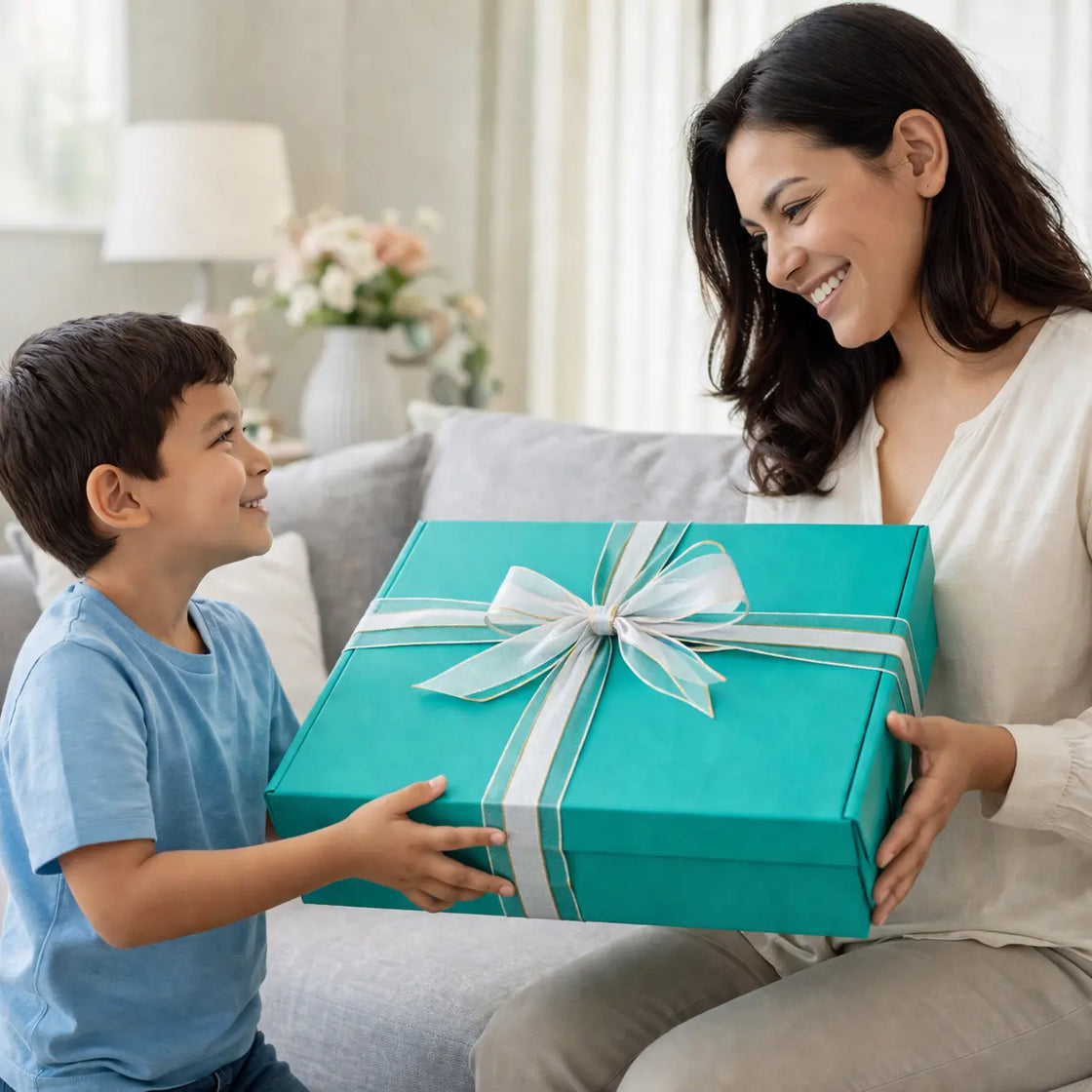 Woman receiving a teal gift box from a child in a home setting