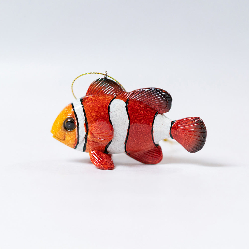 a side view of rengora tropical fish ornament stands out against a clean white background