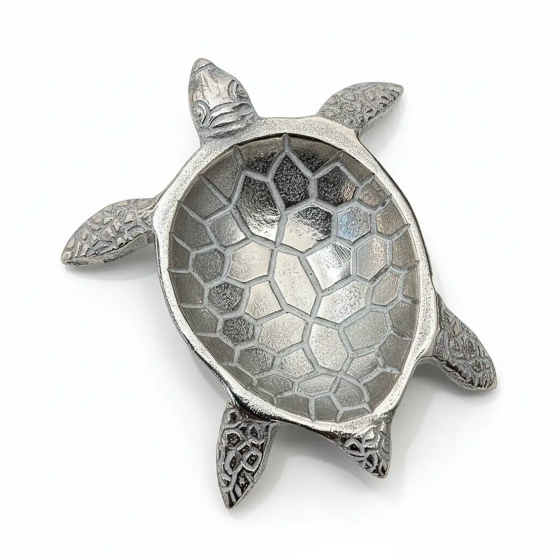Silver turtle-shaped decorative jewelry trinket on a white background