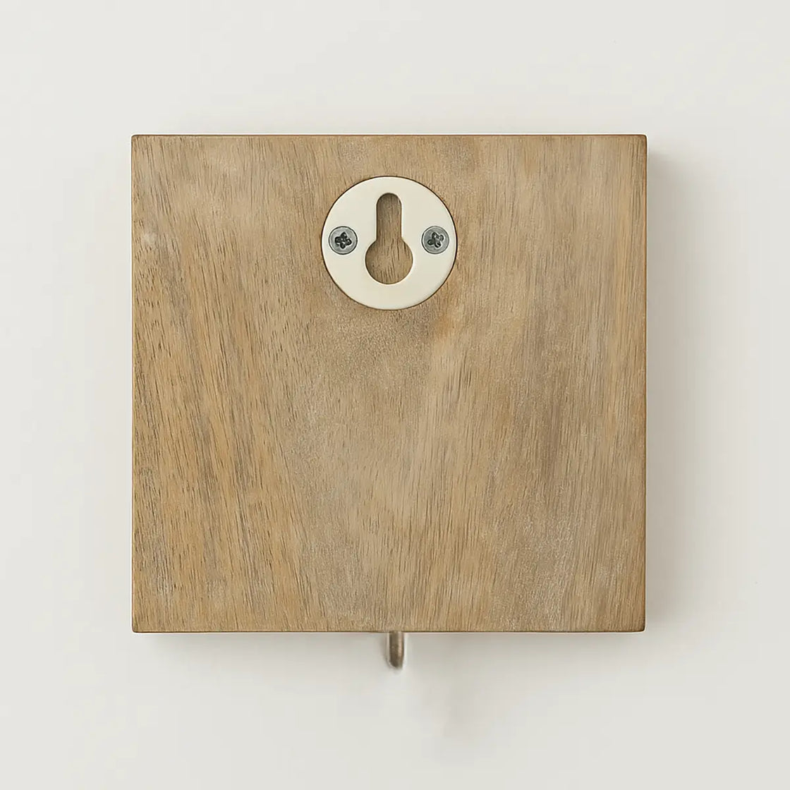 Wooden wall-mounted box with a metallic cover on a white background
