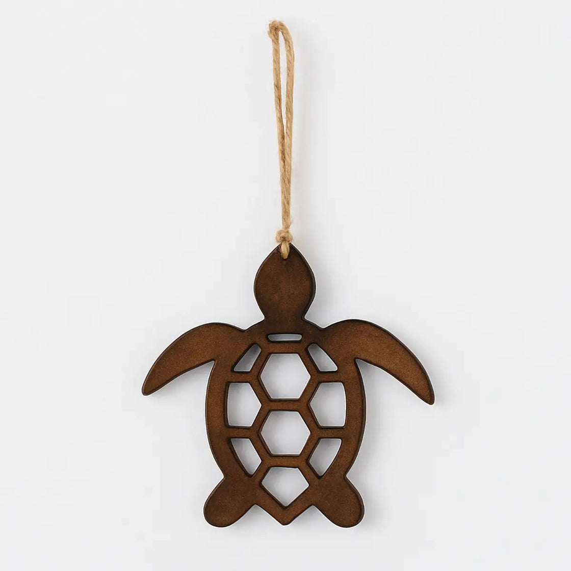 Wooden turtle ornament hanging on a white background