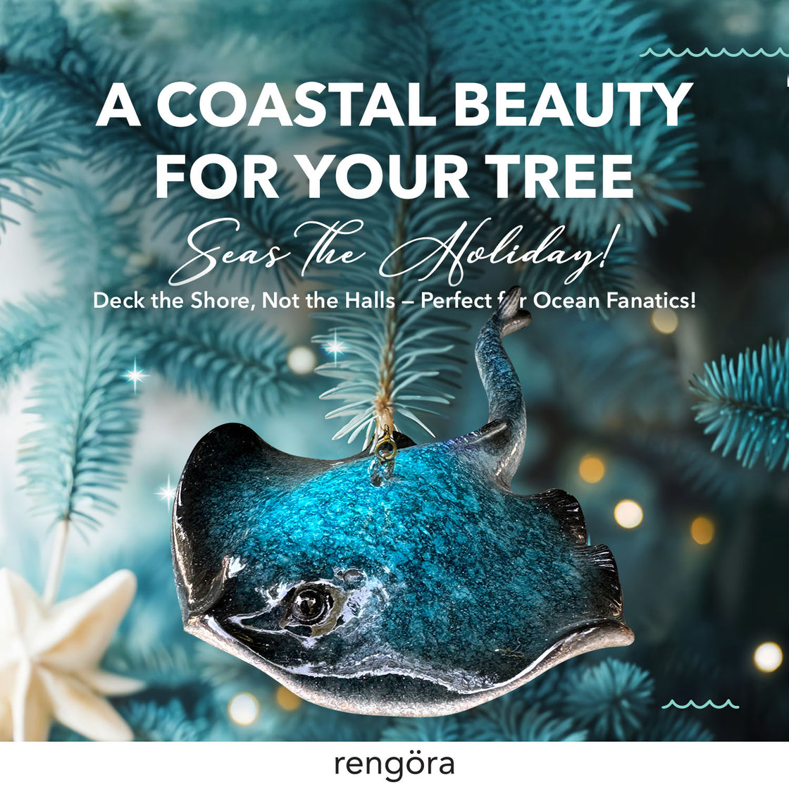 A glossy teal stingray ornament, suspended by a gold cord, shown against a background of pine branches and warm lights.