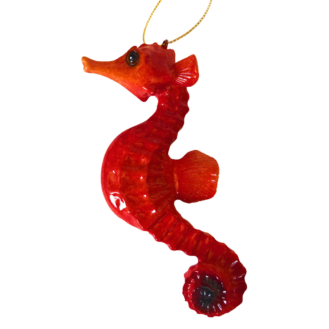 close up of red seahorse Christmas ornament on white background