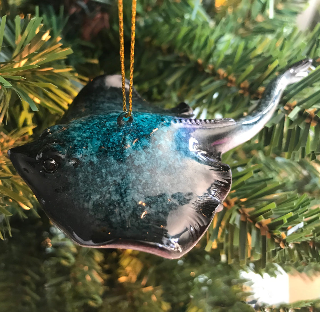 blue sting ray Christmas ornament hanging on tree