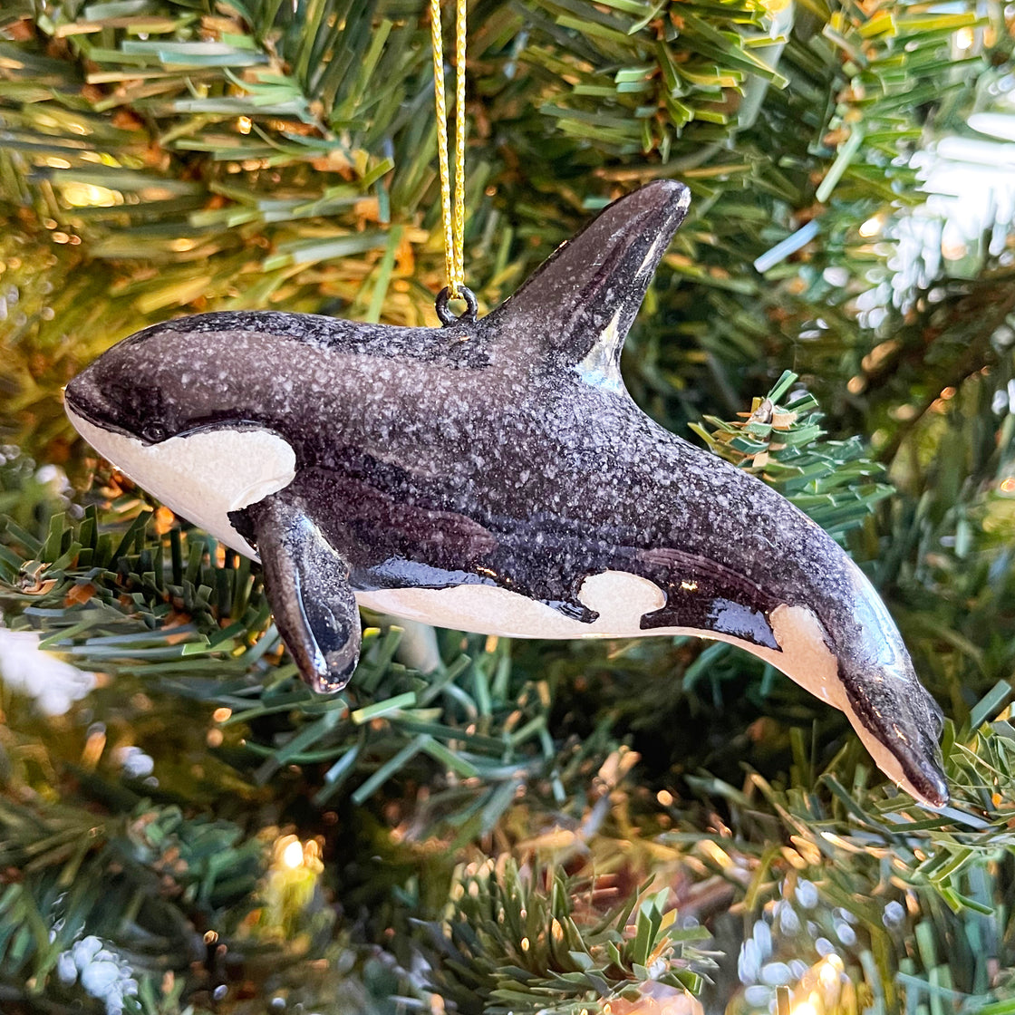 The Rengora Orca Killer Whale Christmas ornament adorning a Christmas tree