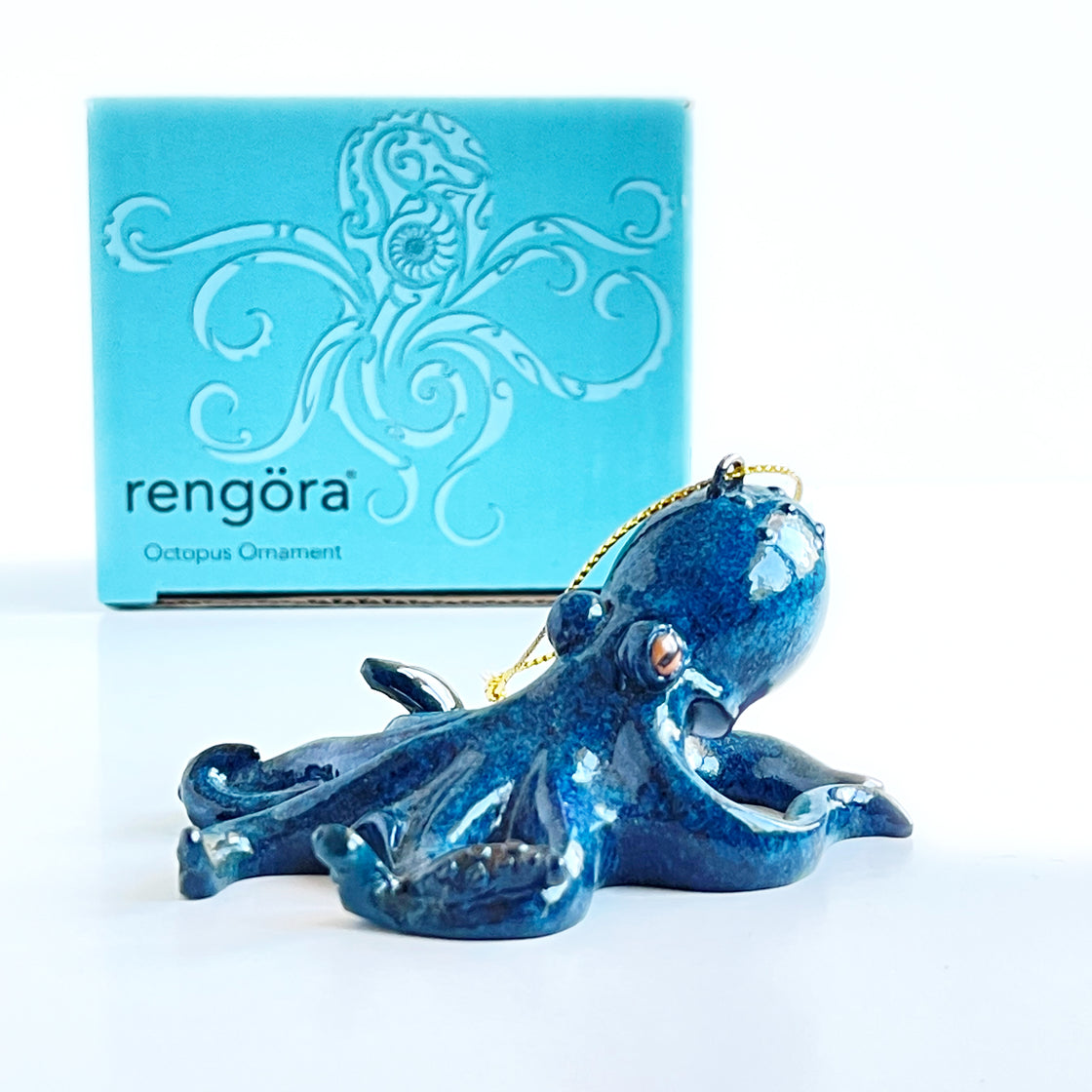 revealing the distinctive packaging of the Rengora octopus ornament against a plain white background