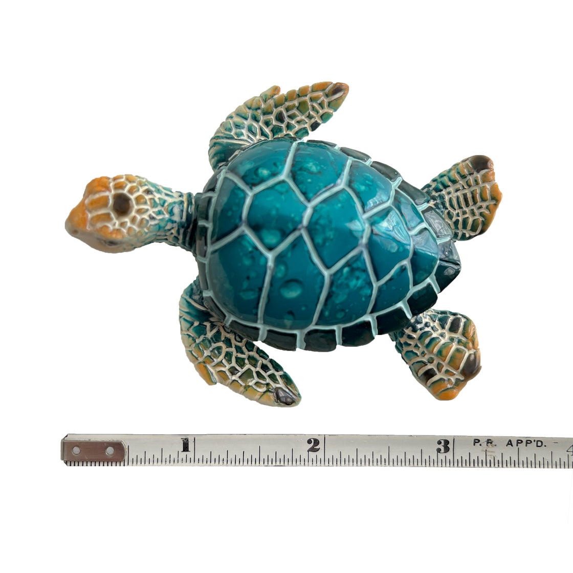 A top - view rengora turtle refrigerator magnet measures 3 inches in size