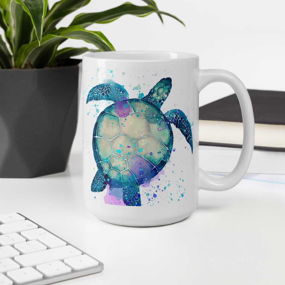 15 oz sea turtle coffee mug on desktop with potted plant and keyboard